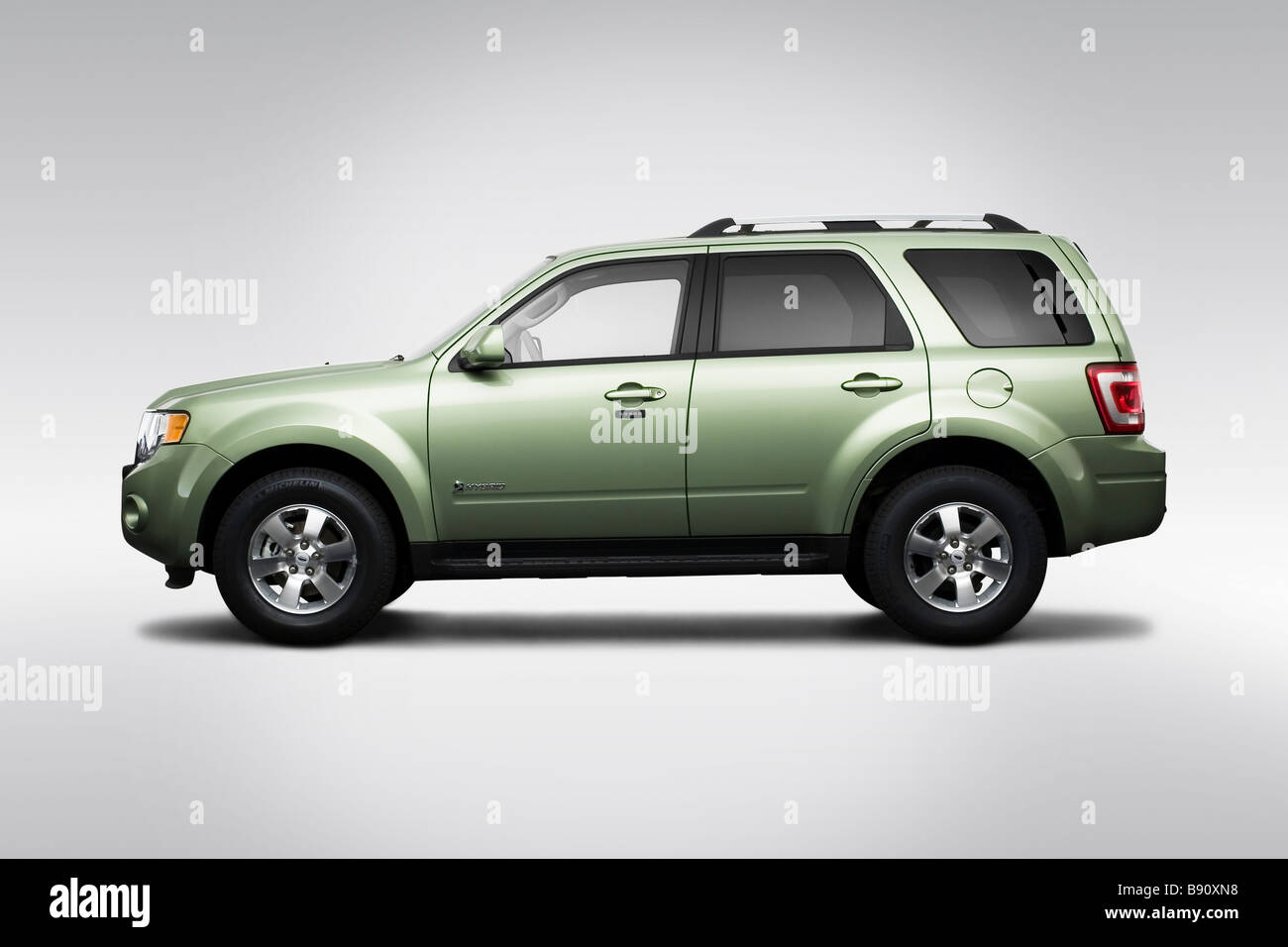 2009 Ford Escape Hybrid LIMITED in Green - Drivers Side Profile Stock Photo  - Alamy