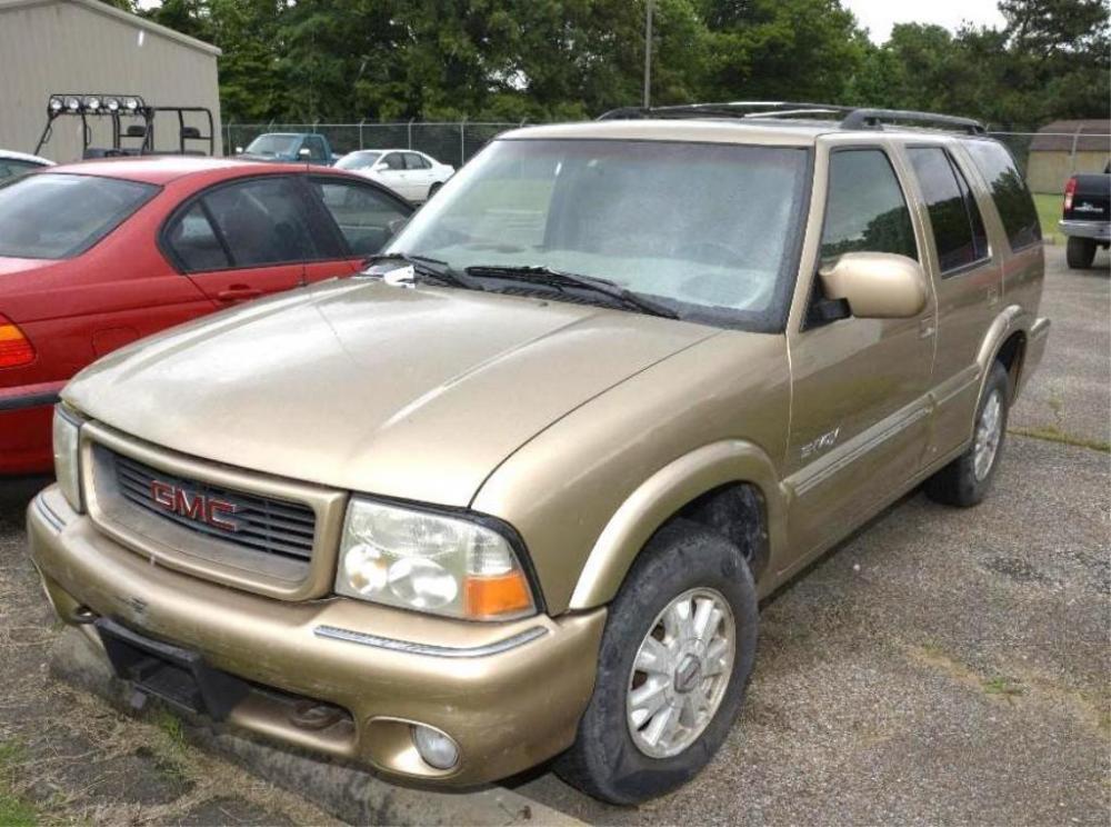 1999 GMC ENVOY SUV - GOLD- 178,475 MILES- PIECE MISSING FROM RIGHT QUARTER  PANEL, DAMAGE ON FRONT PASSENGER FENDER, SOME INTERIOR DAMAGE. VIN #  1GKDT13W1X2951440 For Sale | MarkNet Alliance