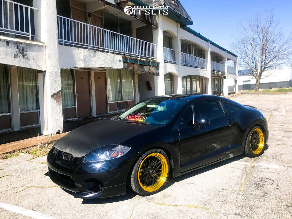 2009 Mitsubishi Eclipse with 18x9 25 STR 520 and 245/45R18 Continental All  Season and Coilovers | Custom Offsets