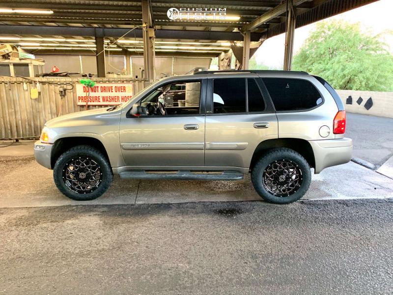 2003 GMC Envoy with 20x9 Anthem Off-Road Avenger and 32/10.5R20 Toyo Tires  Open Country A/T III and Suspension Lift 3" | Custom Offsets