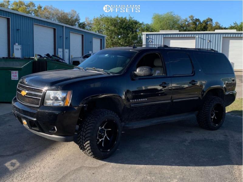 2014 Chevrolet Suburban 1500 with 20x12 -51 Vision Prowler and 33/12.5R20  AMP Mud Terrain Attack MT A and Suspension Lift 4" | Custom Offsets